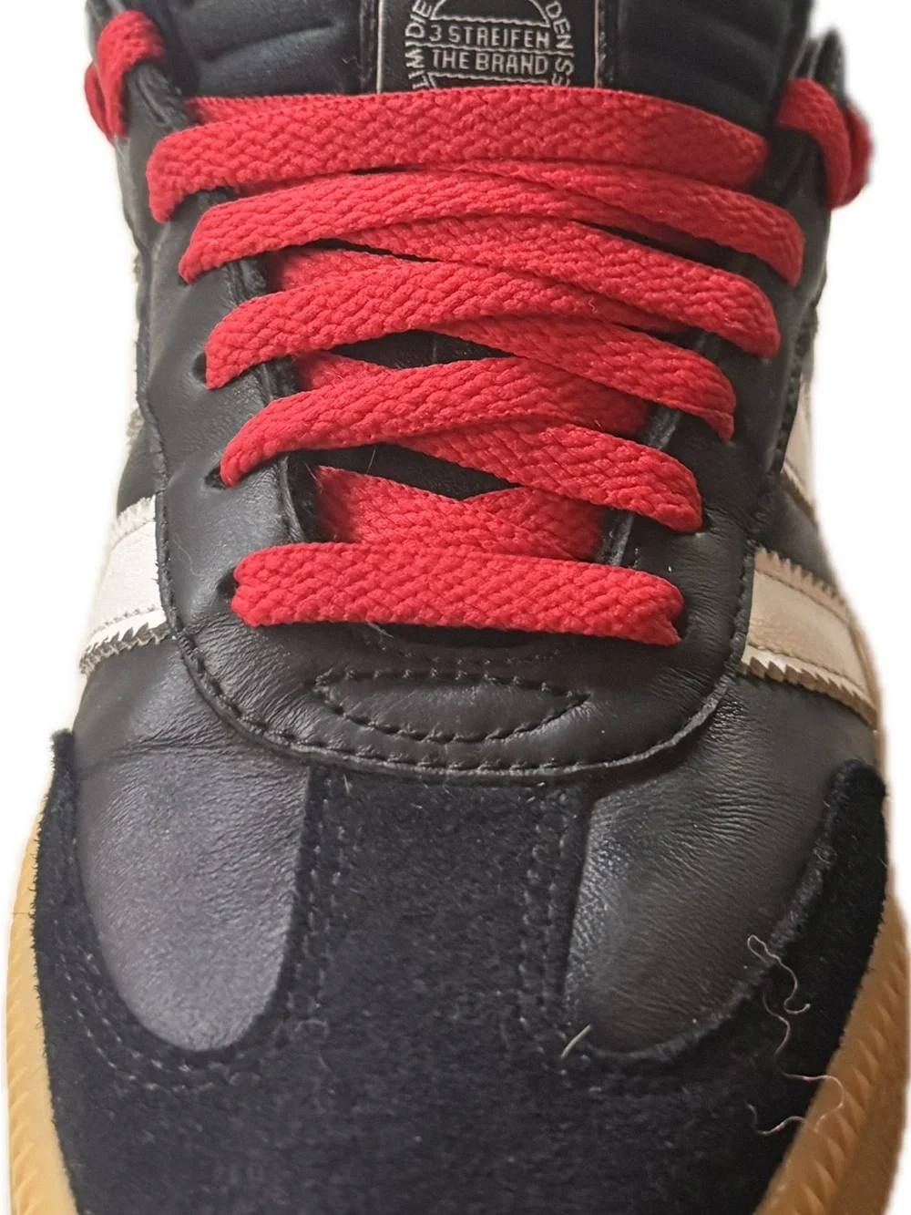adidas  Black Sneakers with Red Laces and White Stripes